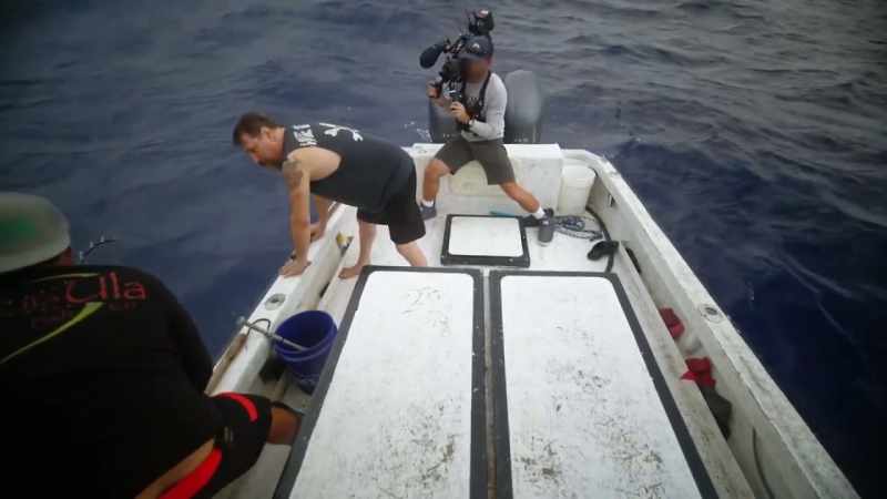 [john] behind his head. -Try getting anywhere in the gill plate