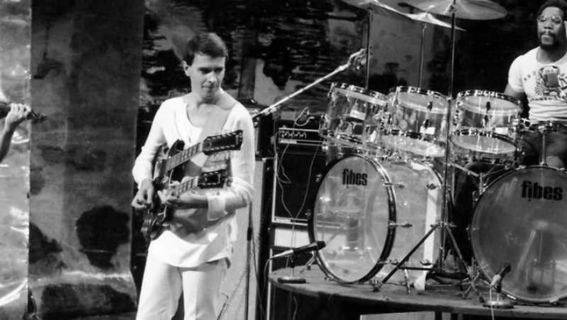 John McLaughlin was kicking my back at the time