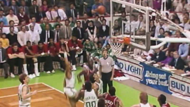Jordan hangs in the air, puts it down