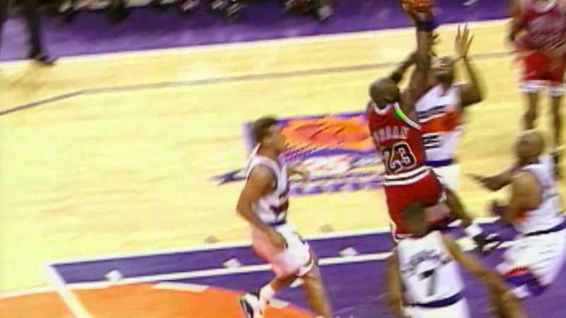 Jordan spins away on Majerle