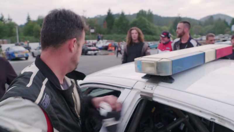 Just as JF goes to the podium, Connor spots something inside his car