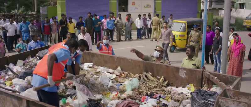 Just remove the garbage from the top of the corpse without touching it