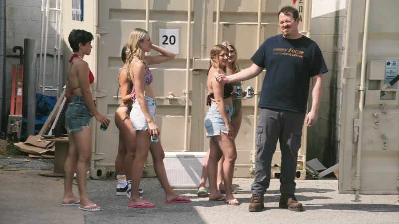 Just trying to get these women into a shipping container