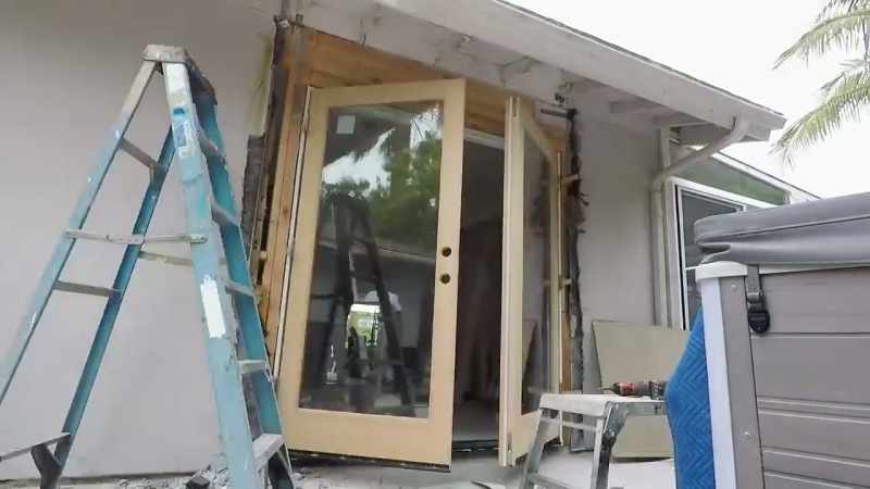 Justin and his dad replaced the light in this bathroom