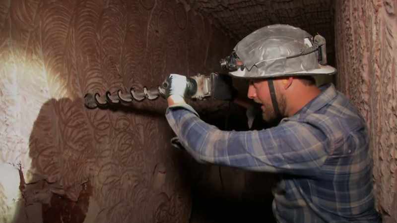 Justin's still drilling holes into walls