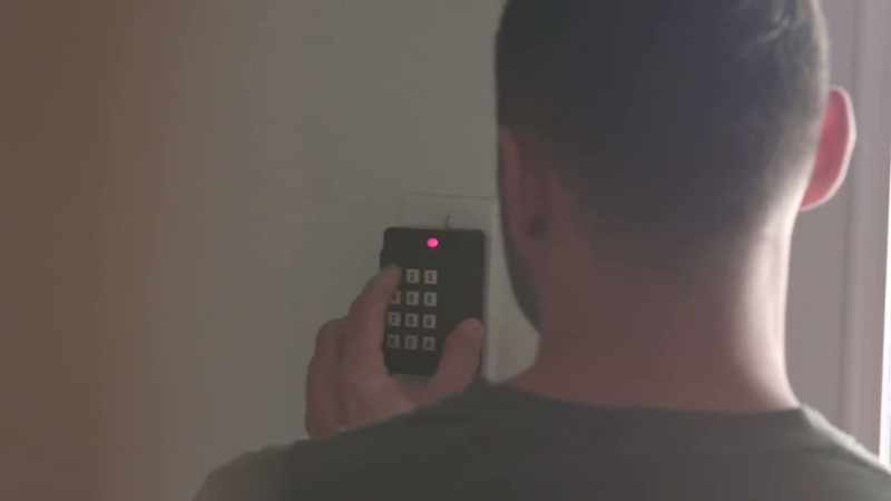 (keypad beeping)