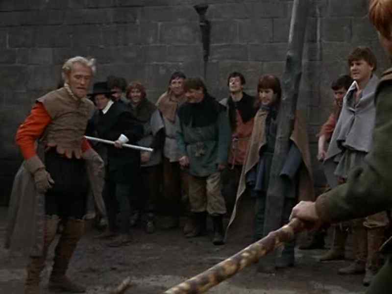 [Kicks quarterstaff]