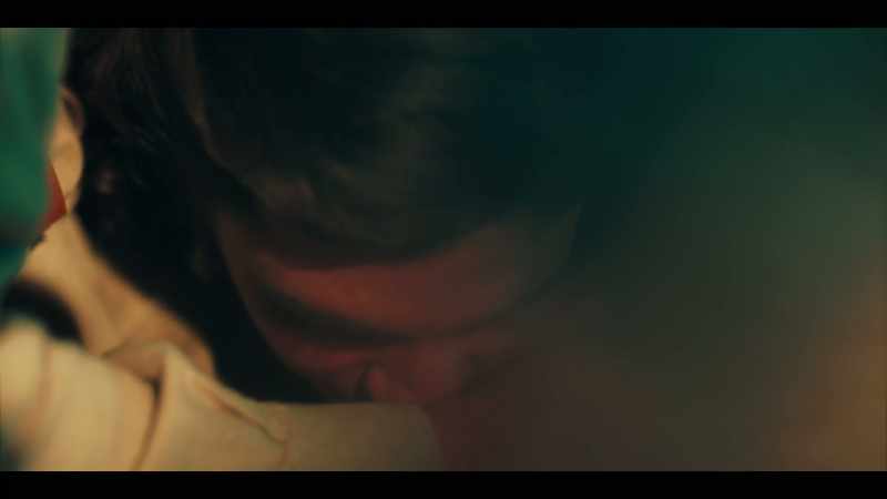 (KISSES, EXHALES)