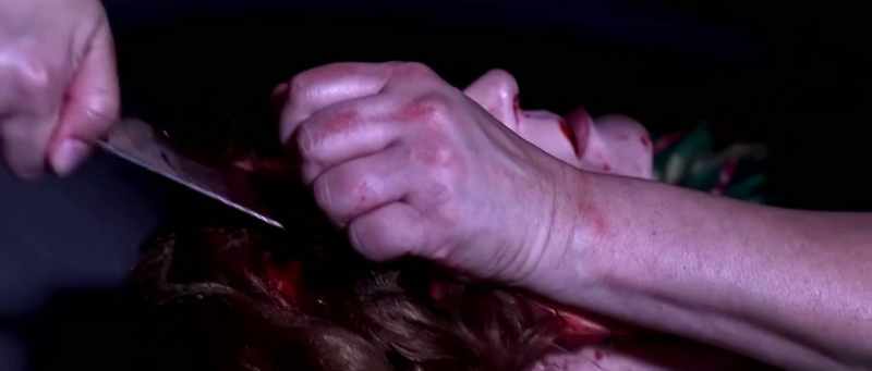 (knife continues squelching) (eerie music continues)