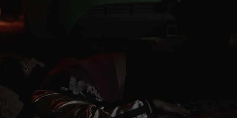 Kumantjayi was laying on the ground, next to the car