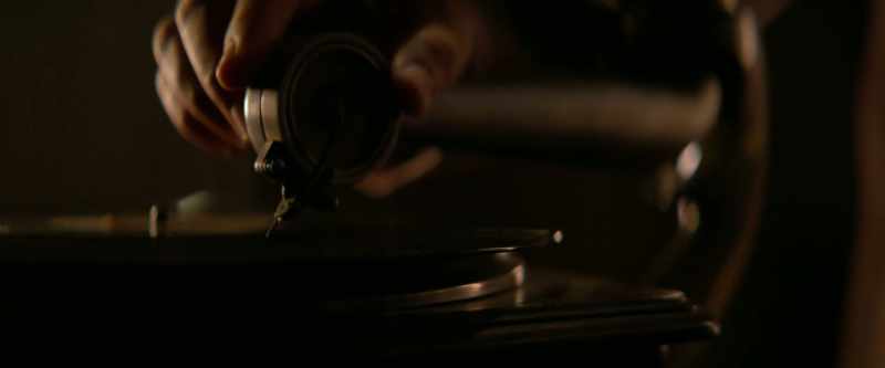(LAID-BACK MUSIC PLAYING OVER GRAMOPHONE)