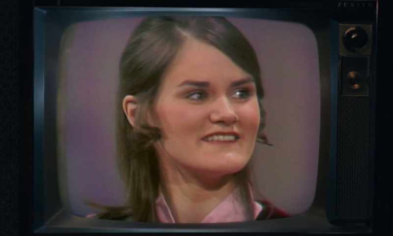 (laughter over TV)