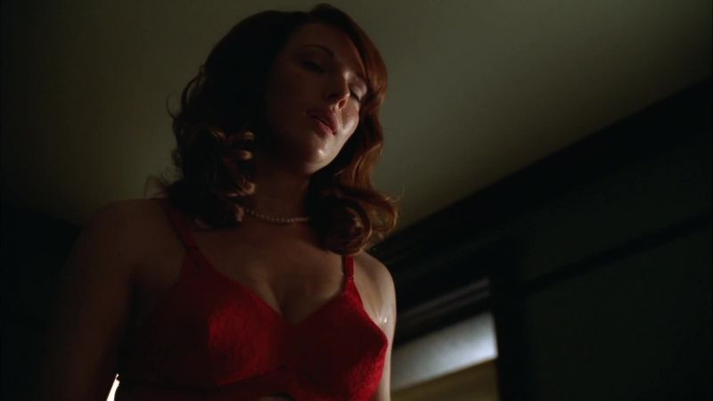 Let me take off my brassiere. -No. In a minute
