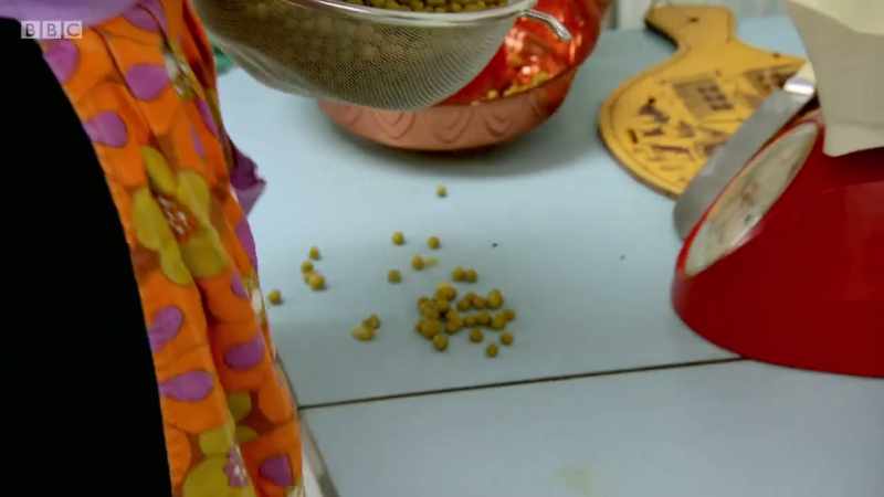 Let's just all pour the peas down the hole. Hold on