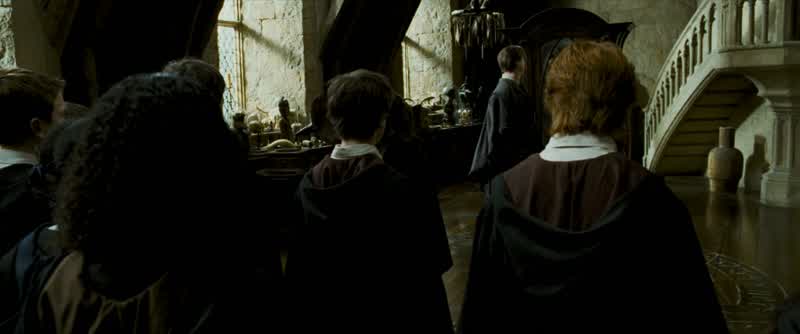Let's practice it now Without wands pleaseAfter me RiddikulusRiddikulus Very goodA little louder and very clear ListenRiddikulus RiddikulusThis class is ridiculous Very good