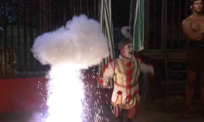 (lighthearted circus music) (explosion thudding)