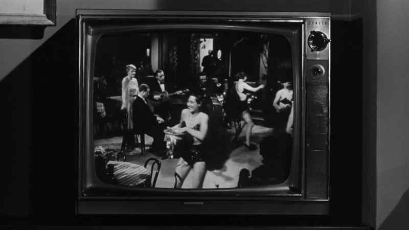 [LIVELY MUSIC PLAYING ON TV]