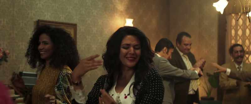 [lively Persian music playing over speakers]
