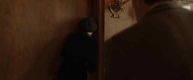 (LOCKS DOOR)