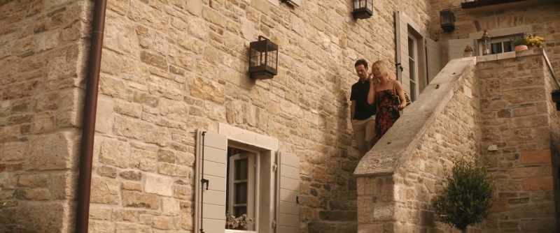 Look, she's with a stranger in a strange place