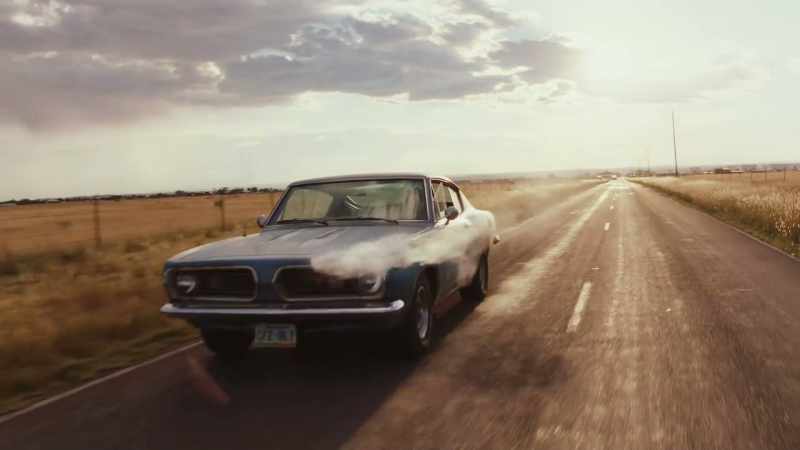 (loud bang, wheel rattling)