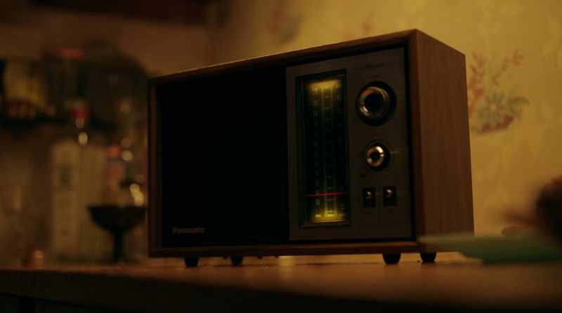 [loud radio static]