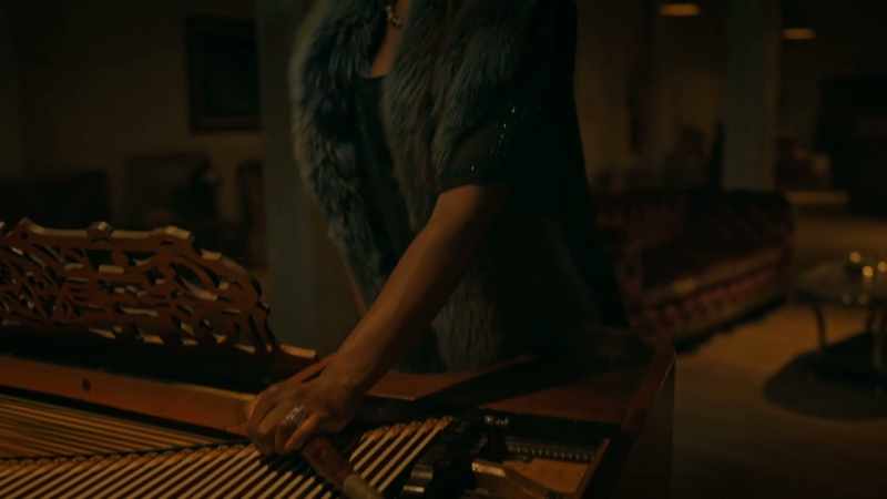 [low piano notes playing]