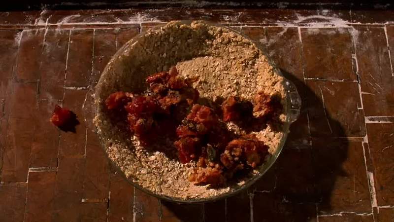 Lumpy oatmeal with fruitcake mashed in