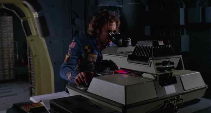 (Machine humming)
