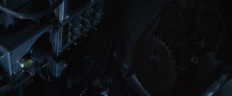 [MACHINERY CLUNKS, WHIRS]