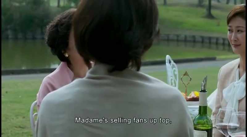 Madame's selling fans up top