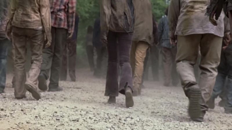 Maggie, Michonne, somethin's up at the camp