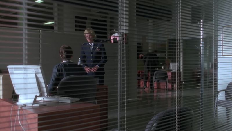 Major Carter. l'm here to see Agent Barrett
