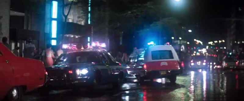 MAN: All right, move back. Let the ambulance through