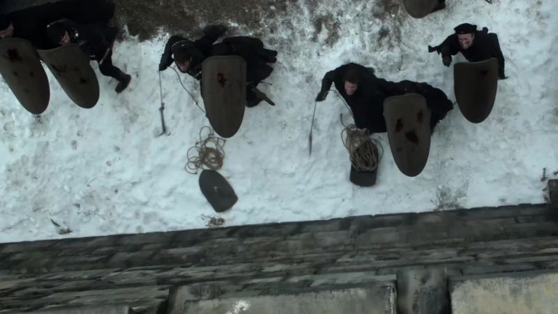 Man: Archers, loose!