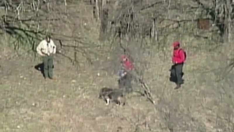 Man: In a wooded area