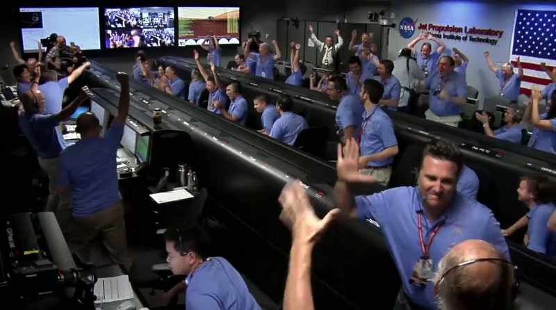 MAN (indistinct over PA) - (cheering)