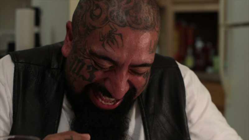 (man laughing)