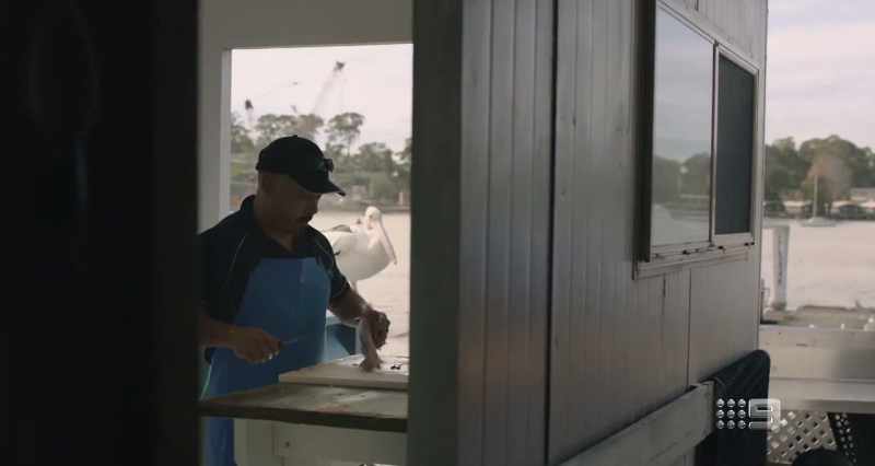 MAN: My main job is to cut the fish and process the fish