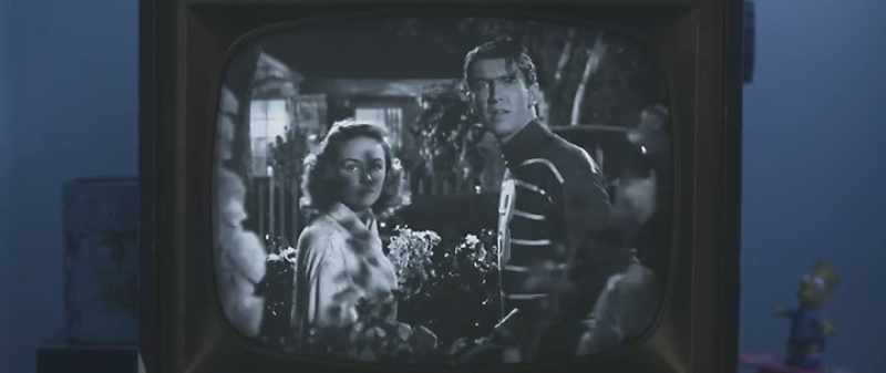 [man on television] Why don't you kiss her