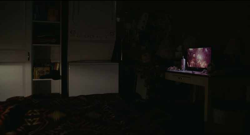 [man on TV] Happy New Year! -[crowd cheering]