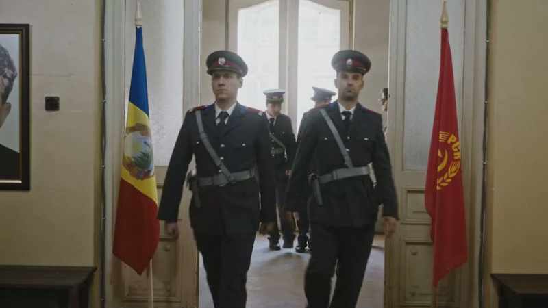 MAN (OVER P.A.): All units, Detectives Baciu and Anghel