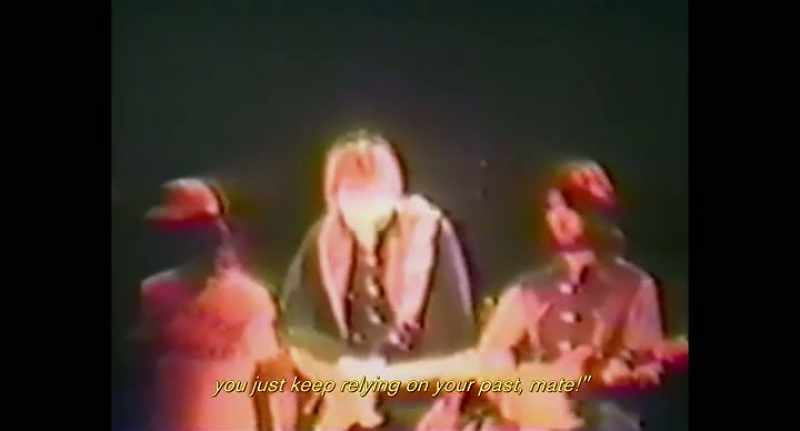 [man speaking]