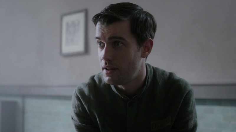 Margot in a prison uniform? Mail-sack stitching?