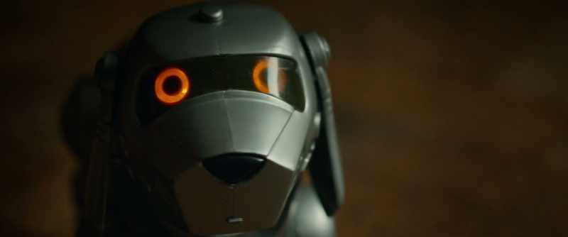 [mechanical dog beeping]