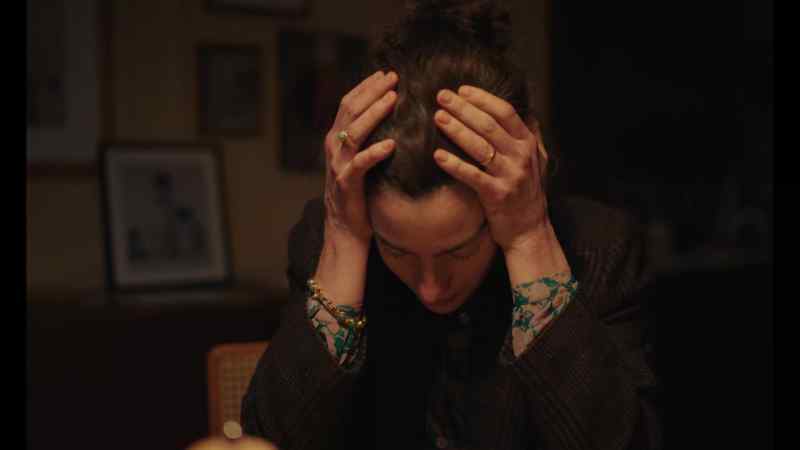 [melancholy music playing] -[sniffles]