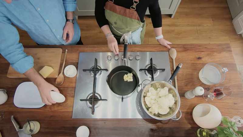 Melting some butter and then stirring in some flour