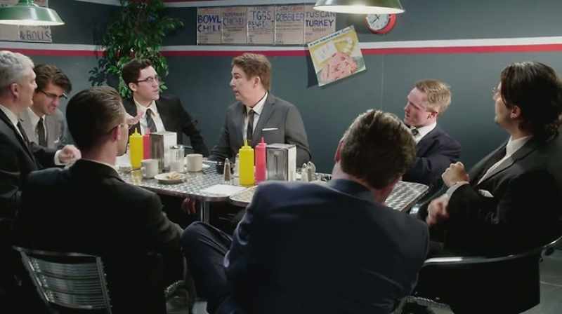 [ men grumble ]