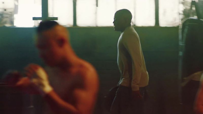 [men grunting]