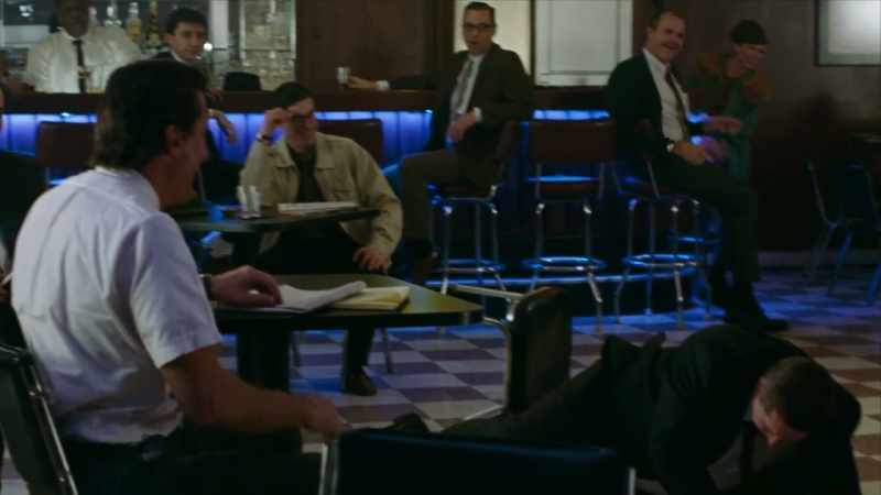 [ Men laughing, talking indistinctly ]